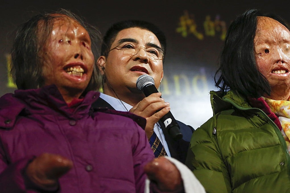 Chinese philanthropist Chen Guangbiao with mother and daughter, Hao Huijun (left) and Chen Guo. Photo: Reuters