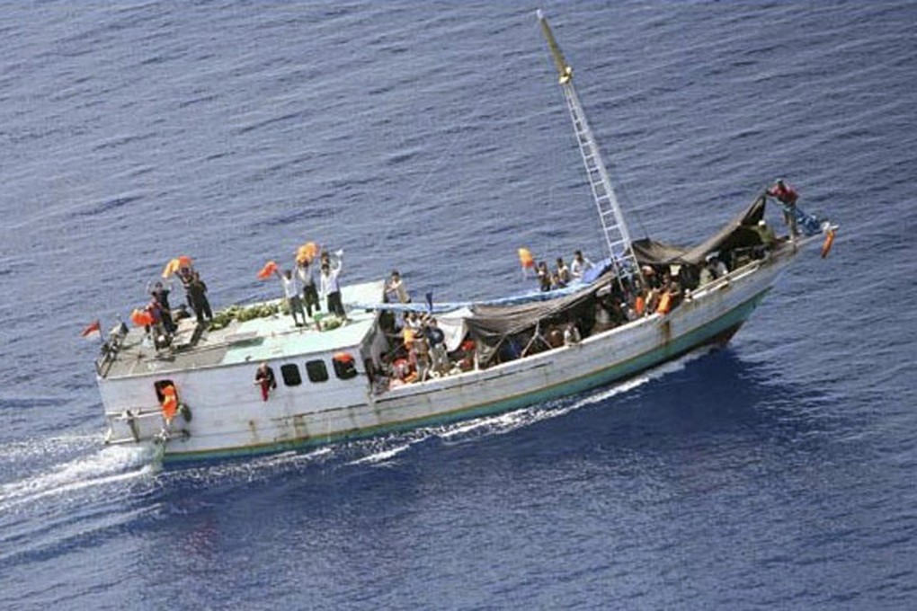A boat carrying suspected illegal immigrants seen from a Border Protection Command aircraft in Australian waters. Photo: Reuters