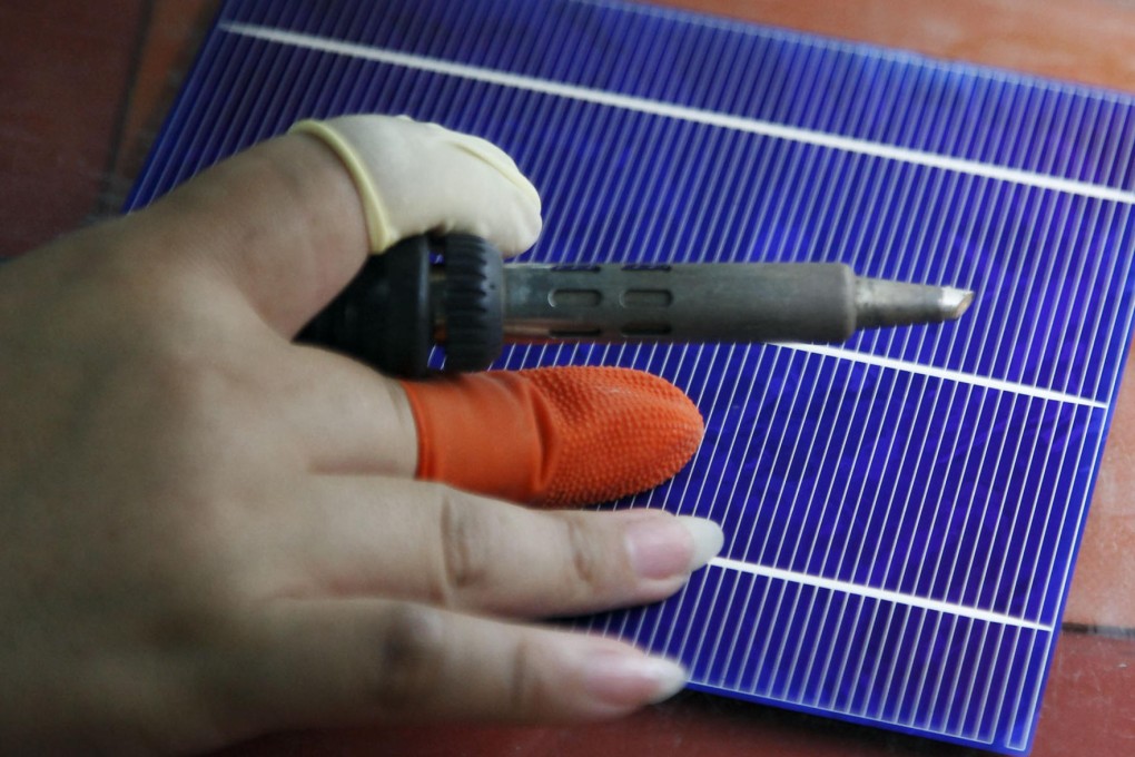 Beijing is encouraging banks to fund clean energy projects such as solar farms to cut the mainland's reliance on coal. Photo: Bloomberg