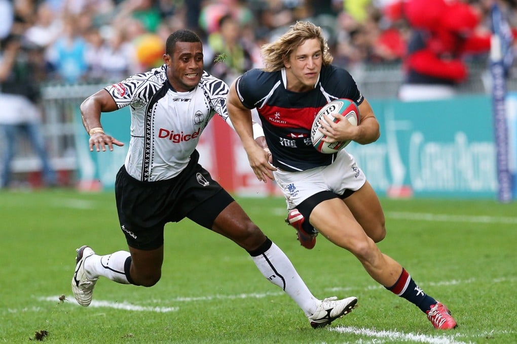 Fiji's Samisoni Viriviri chases Hong Kong's Tom McQueen during last year's Hong Kong Rugby Sevens. Photo: KY Cheng