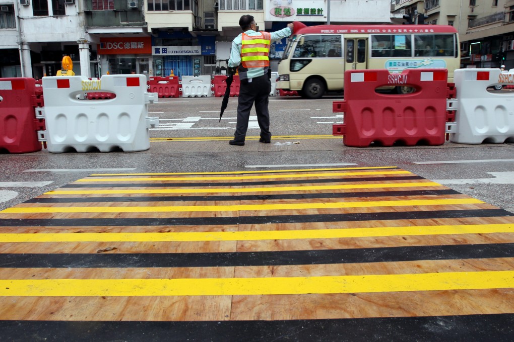 A pedestrian crossing in Sha Tin. Police said there were no pedestrian-crossing facilities around Heung Fan Liu Street, where a boy was hit by a minibus on Thursday. Photo: Felix Wong