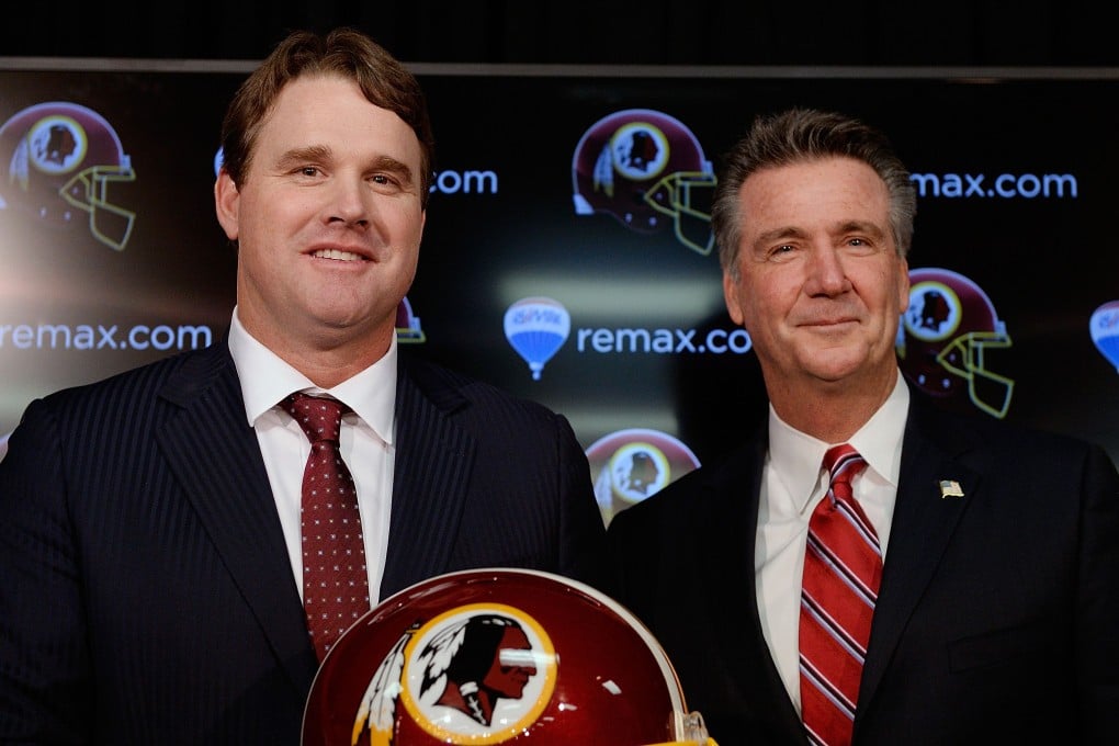 Jay Gruden with Washington Redskins general manager Bruce Allen after he was introduced as the new head coach. Photo: AFP