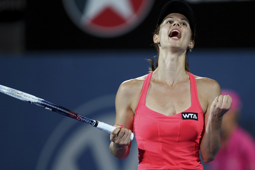 Tsvetana Pironkova clenches her fist and yells out after winning a break point in her final against Angelique Kerber of Germany. Photo: AP
