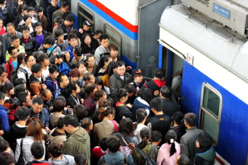 Mass migration as workers return home for the Lunar New Year creates huge demand for train tickets - a fact that scalpers have taken advantage of. Photo: Xinhua