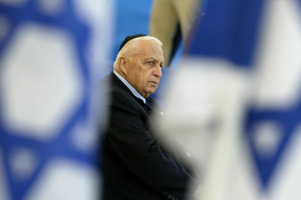 As prime minister in 2004, Ariel Sharon attends a memorial ceremony. Photo: AP