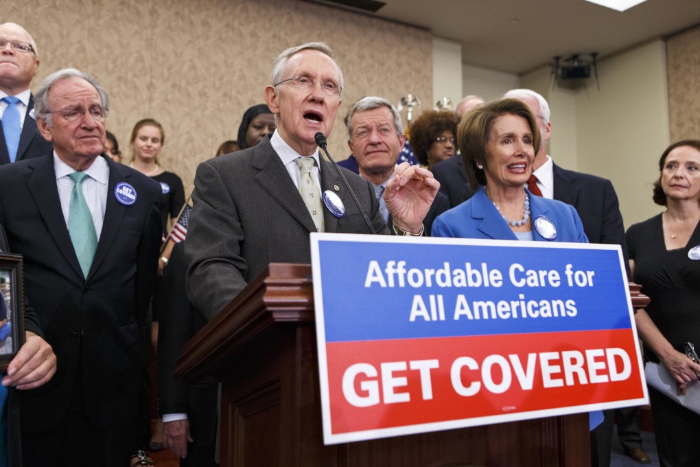 Congressonal leaders celebrate start of Obamacare. Photo: AP