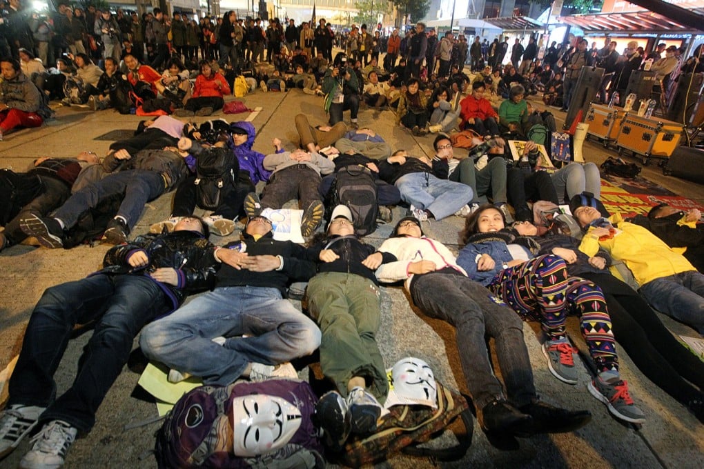 People supporting universal suffrage protest at Chater Road on New Year's day. Photo: Sam Tsang
