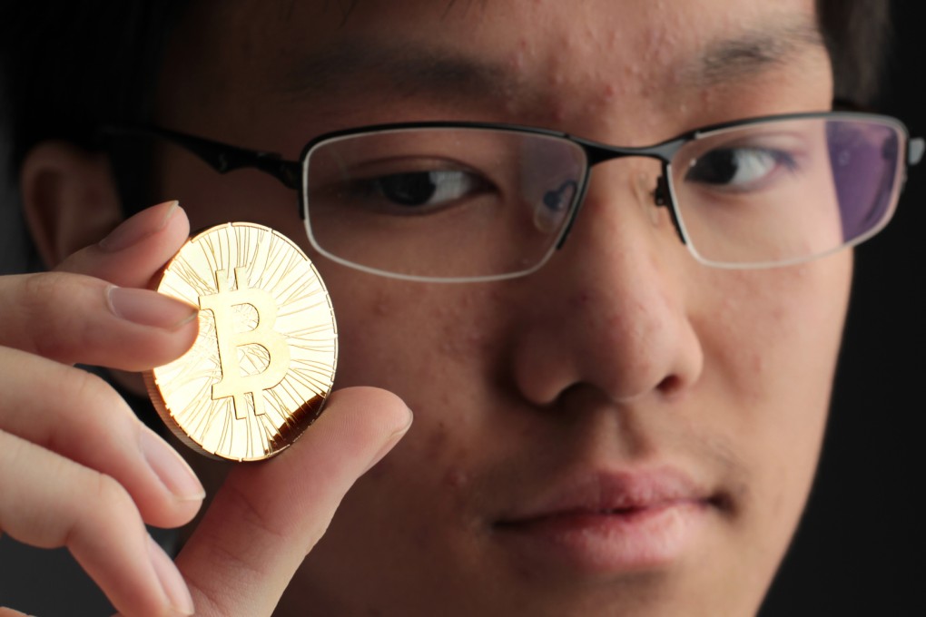 Casper Cheng Tsz-chun, 16, a Bitcoin enthusiast, poses for a photo at SCMP studio, Causeway Bay on Dec. 18, 2013. Photo: SCMP/Thomas Yau
