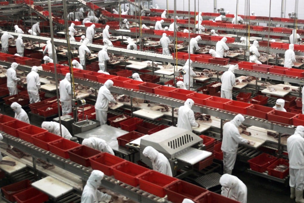 Shuanghui's pork-processing plant in Henan province got a major boost after the acquisition of US pork producer Smithfield Foods. Photo: Reuters