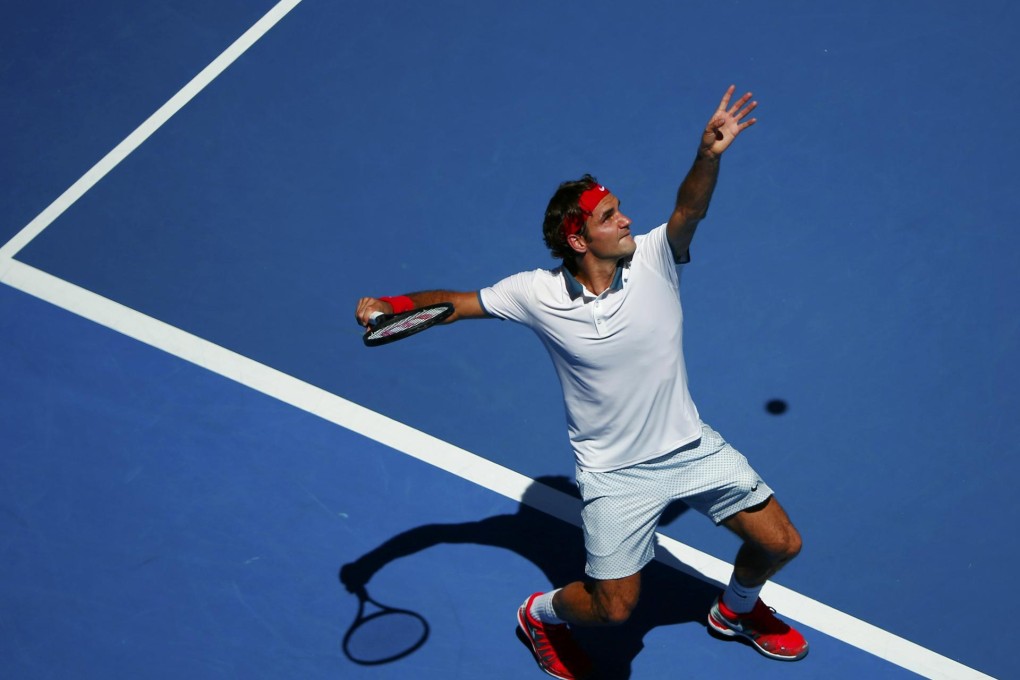 Roger Federer serves to Australian James Duckworth during their men's singles first-round match at the Australian Open. Photo: Reuters