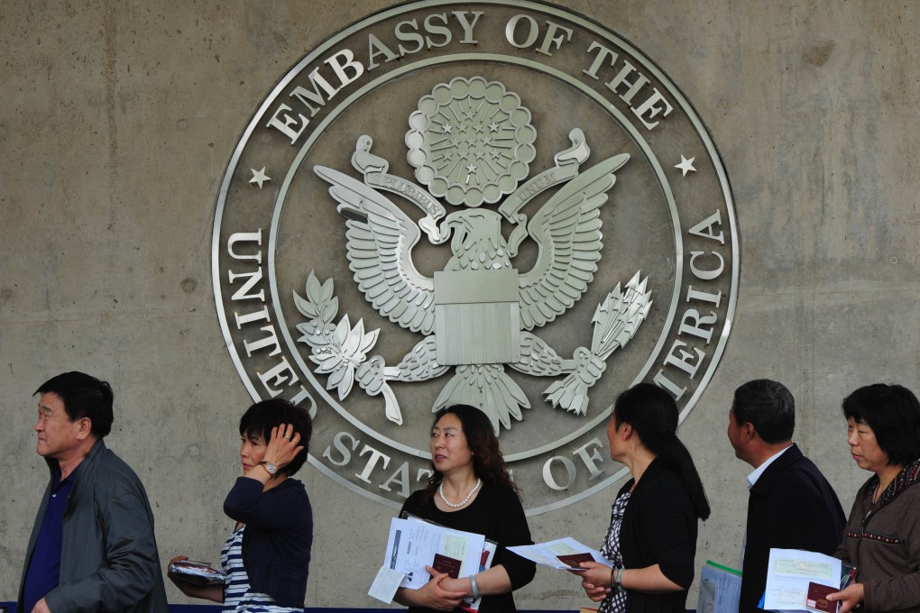 Chinese citizens wait to submit their visa applications at the US Embassy. Photo: AFP