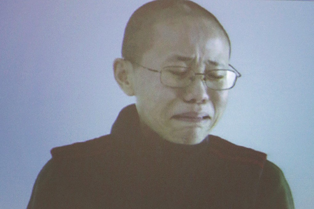 Video clips of Liu Xia reciting poems at her apartment in Beijing were screened in New York City. Photo: AP