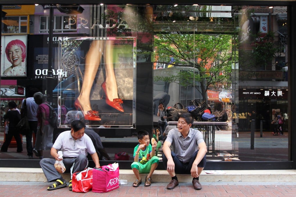 Luxury brand retailers will benefit from increased spending by Chinese tourists travelling outside the mainland. Photo: Nora Tam