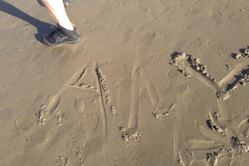 Amy enjoying the sun and sand in California
