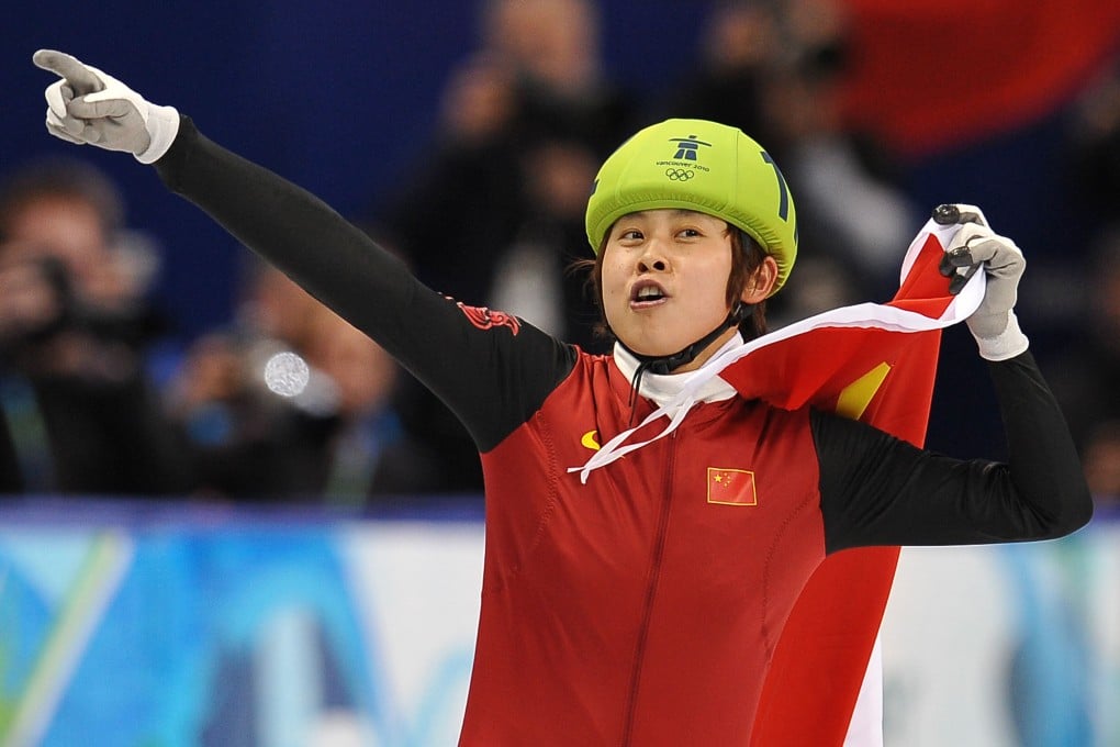 China's Wang Meng celebrates after winning the gold medal in the women's 500-metres short-track speed-skating event at the 2010 Winter Olympics in Vancouver. Photo: AFP
