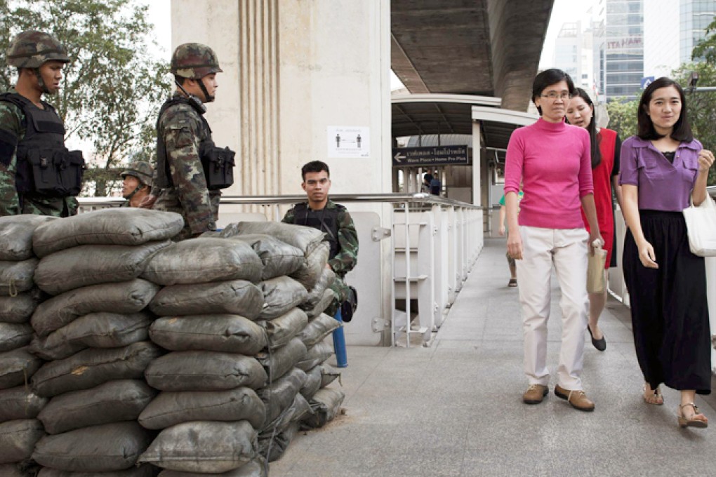 Thai soldiers are on hand in Bangkok yesterday. Photo: AFP