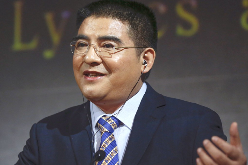 Chen Guangbiao speaks at a New York press event. Photo: Reuters