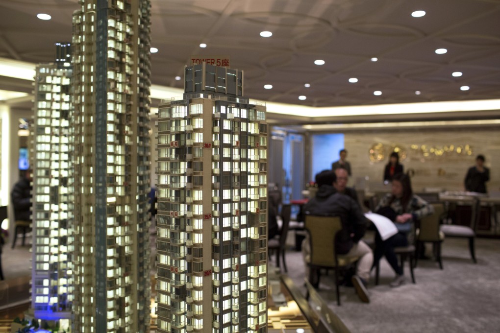 Hong Kong urged to end property controls