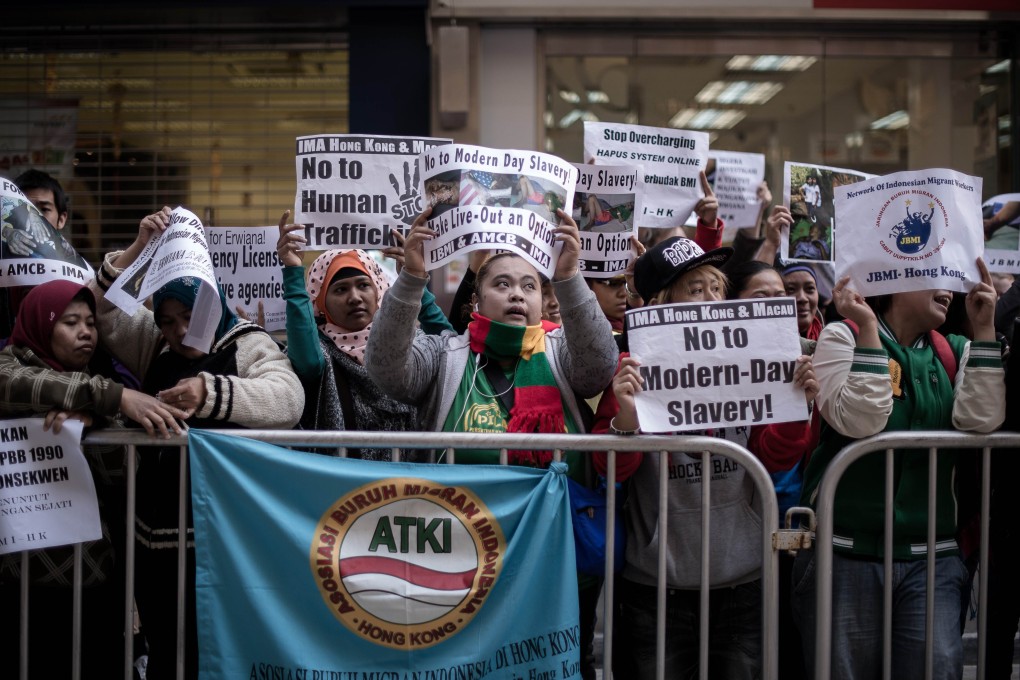 Maids and rights activists protest over allegations of Indonesian maid Erwiana Sulistyaningsih being abused. Photo: AFP