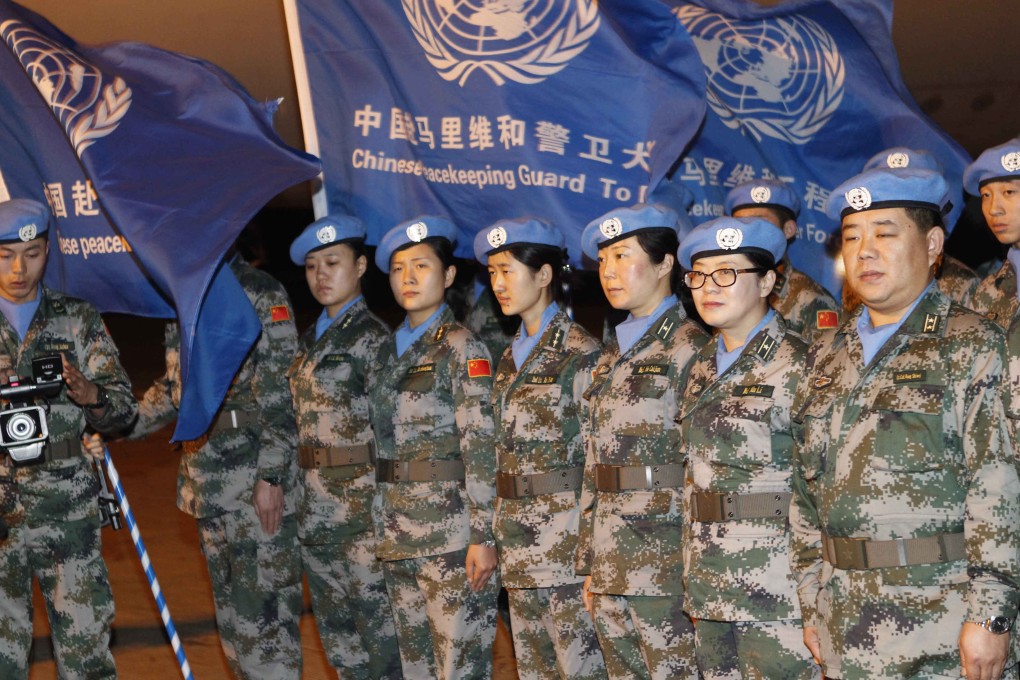 Chinese peacekeepers wearing blue UN berets in Bamako. Photo: Xinhua