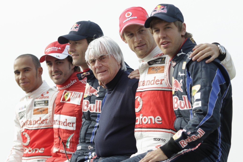 F1 supremo Bernie Ecclestone (centre) with top drivers ahead of the Korean Grand Prix. Despite a bribery indictment in Germany,   the 83-year-old defiantly claims he is still running the sport. Photo: Reuters