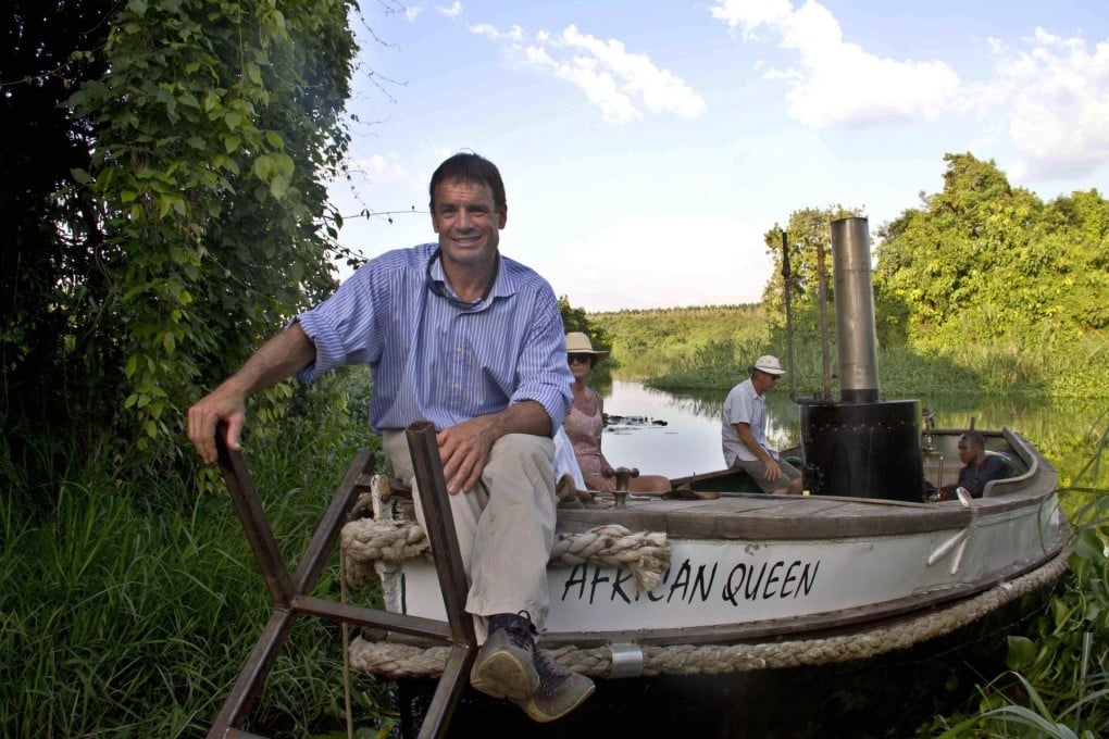 Cam McLeay operates Nile tours in the African Queen. Photo: AFP