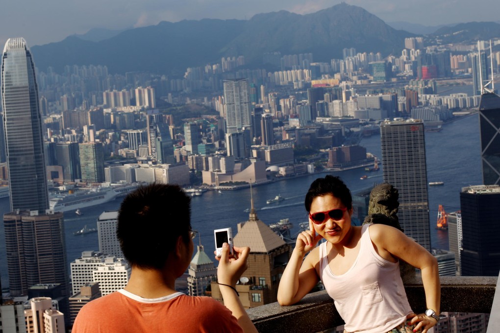 Tourists visit The Peak.