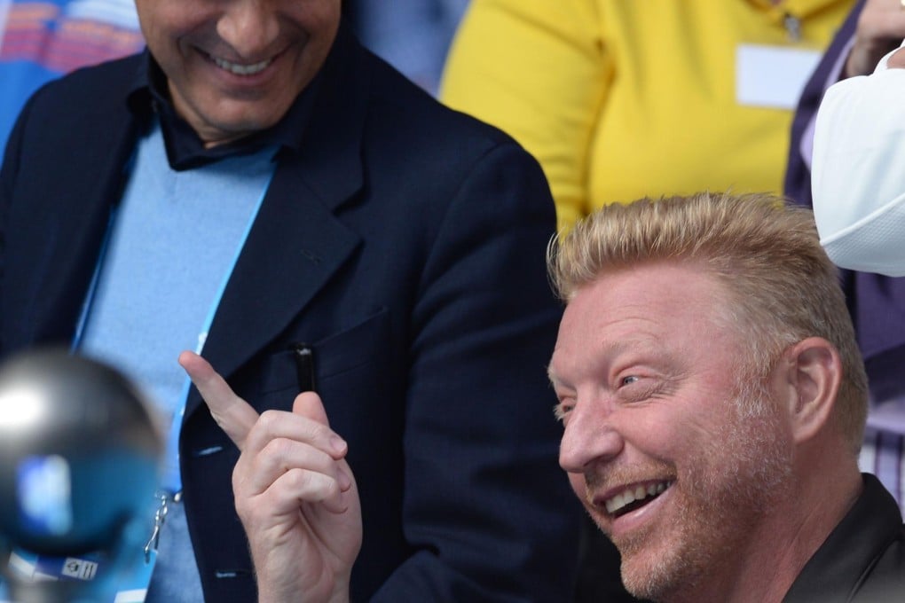 Boris Becker shares a laugh with Serb Novak Djokovic. Photo: AFP