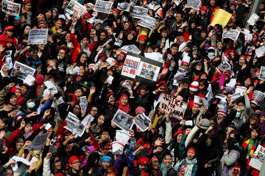 Protesters on the march to government headquarters yesterday in support of Indonesian helper Erwiana Sulistyaningsih. Photo: Nora Tam