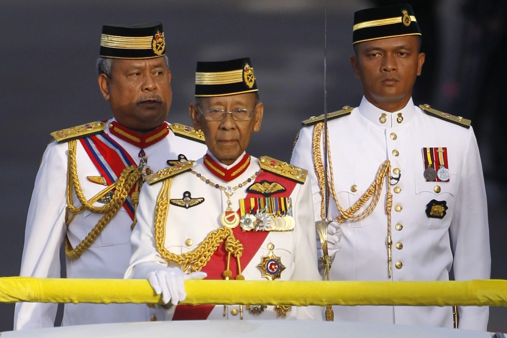 Malaysia's Sultan Abdul Halim Mu'adzam Shah (C) has backed a court ruling barring non-Muslims from using the word Allah to refer to God. Photo: Reuters