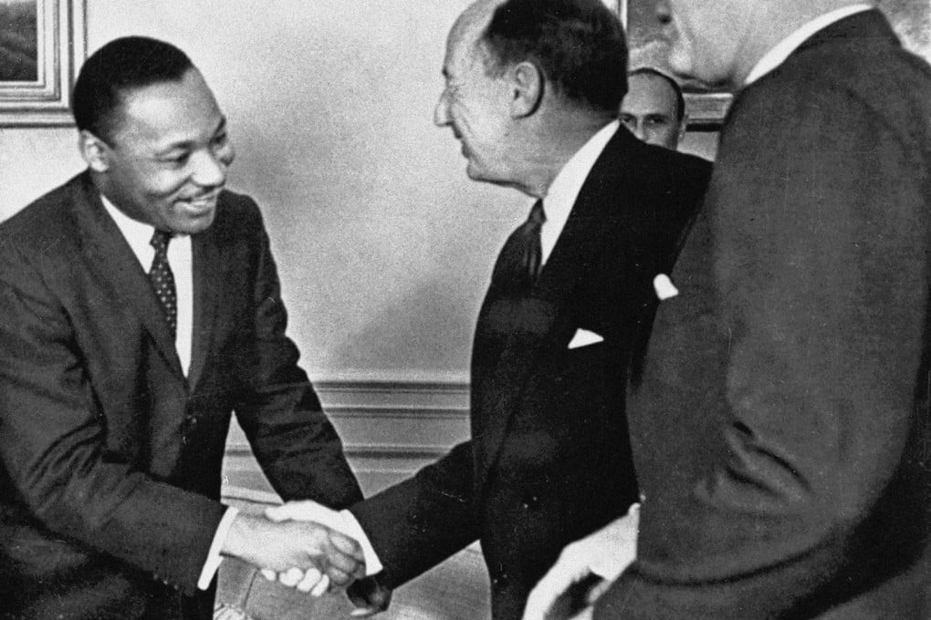 Martin Luther King at a meeting with John F. Kennedy. Photo: AP
