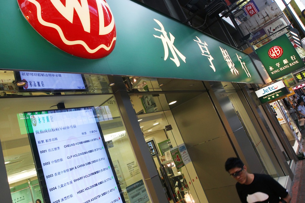 Wing Hang Bank is in exclusive talks with OCBC about a possible acquisition by the Singapore bank. Photo: Sam Tsang