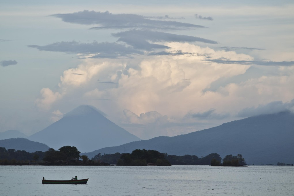A boat navigates the placid waters of Lake Nicaragua, which would have to be continually dredged if the planned canal, due to start construction this year, goes ahead. Photo: AP