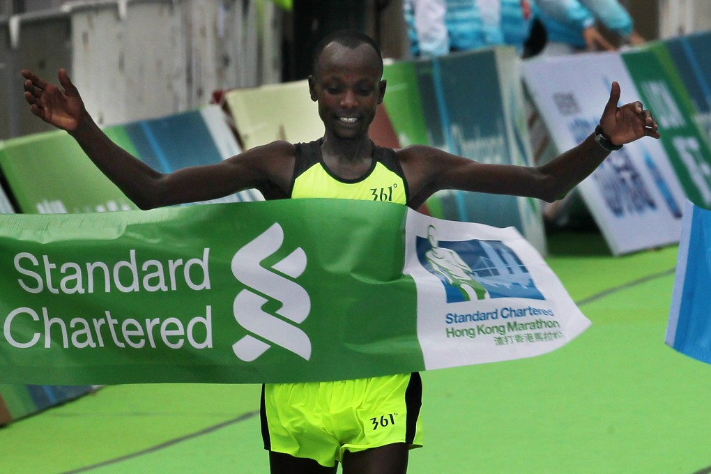 Julius Maisei of Kenya wins last year's Standard Chartered Hong Kong Marathon in two hours, 14 minutes and 18 seconds. Photo: Nora Tam