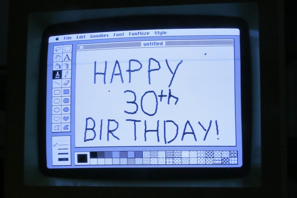 "Happy 30th Birthday" using version 1 of MacPaint seen on a 128 kilobytes Macintosh computer at the Vintage Mac Museum. Photos: Reuters