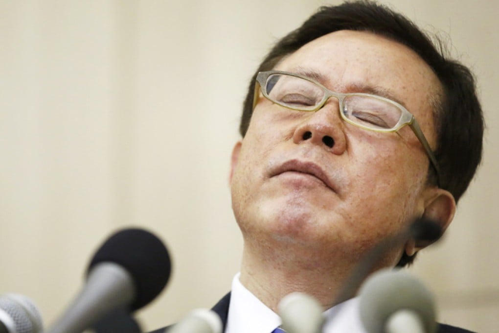 Former Tokyo Governor Naoki Inose during a news conference to announce his resignation in December. Photo: Reuters