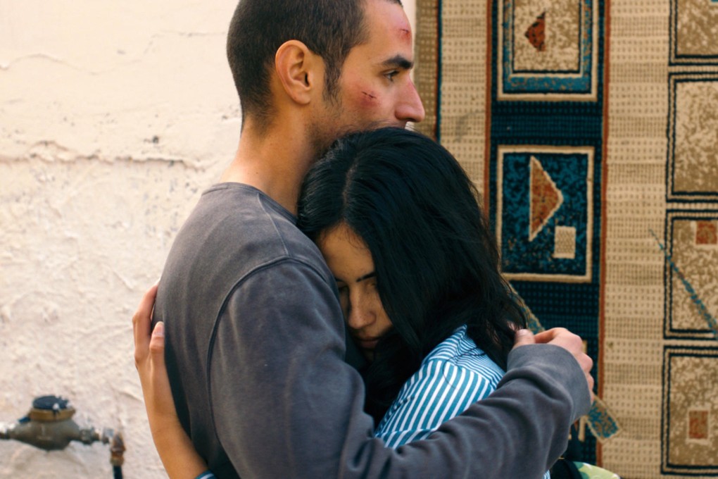 Adam Bakri (left) and Leem Lubany in a scene from Omar. Photo: AP
