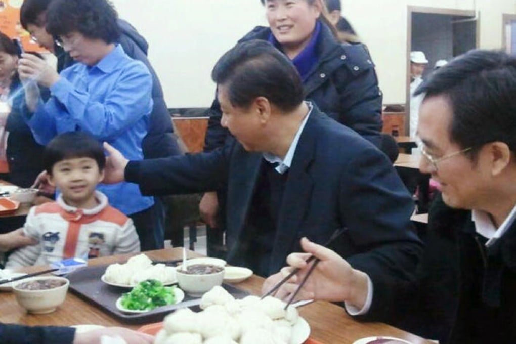 President Xi Jinping enjoys hisbaozi in Beijing. Photo: SCMP