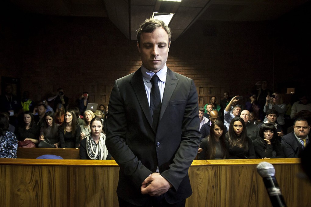 Murder accused Oscar Pistorius appears in the Pretoria Magistrates court in Pretoria, South Africa on August 19, 2013. Photo: EPA