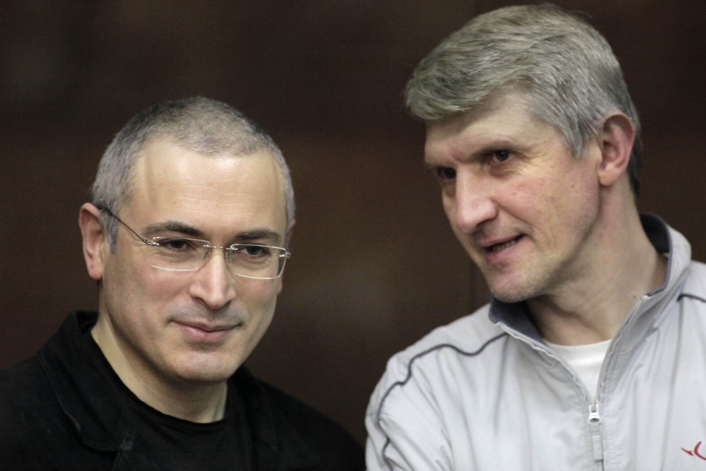 Mikhail Khodorkovsky and Platon Lebedev (right).