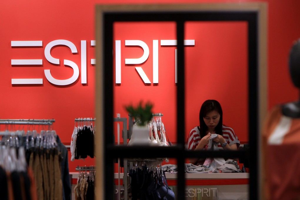 Esprit sees 'slight' profit in first half