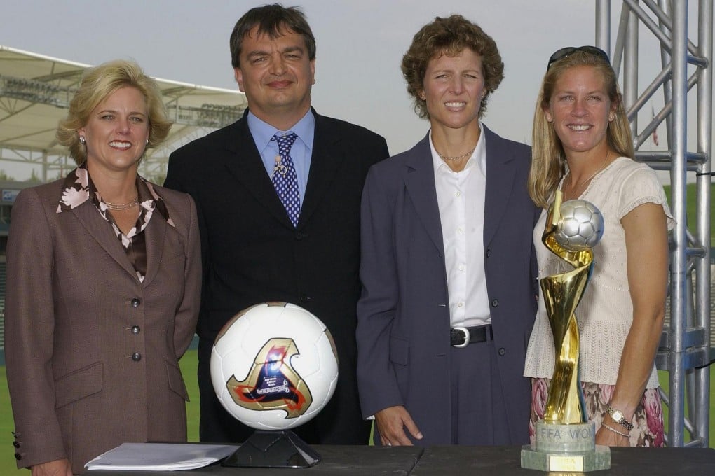 WUSA President Lynn Morgan, Fifa deputy general secretary Jerome Champagne with former players Michelle Akers and Carin Gabarra at the draw for the Women's World Cup USA 2003. Photo: AFP
