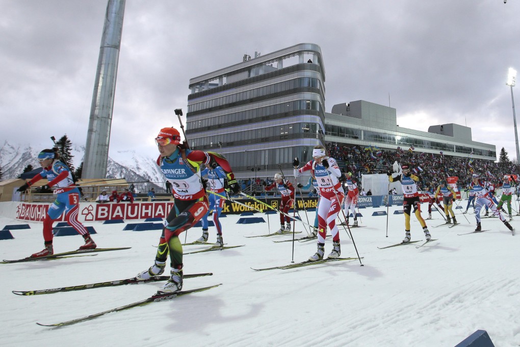 In a 2013 file photo, competitors race during the women's 4x6km World Cup Biathlon relay race at the Laura biathlon stadium in Sochi, Russia. Photo:AP