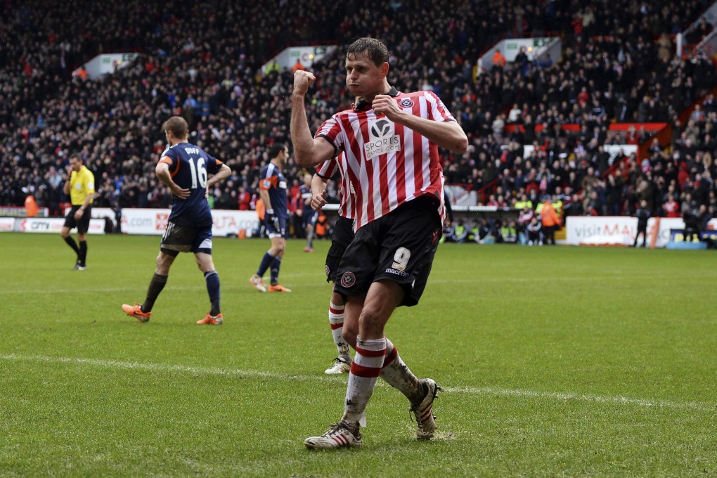 Sheffield United striker Chris Porter celebrates after scoring in their FA Cup fourth-round match against Fulham. Photo: Reuters
