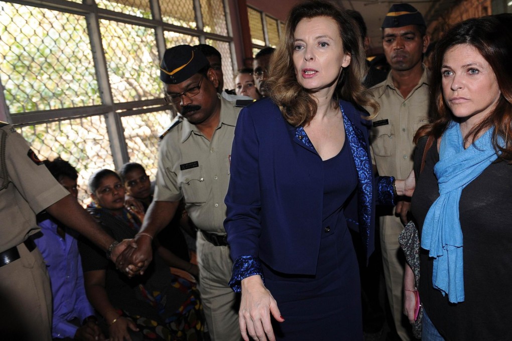 Valerie Trierweiler (centre) and French actress Charlotte Valandrey tour the children's ward at the Sion hospital in Mumbai. Photo: AFP