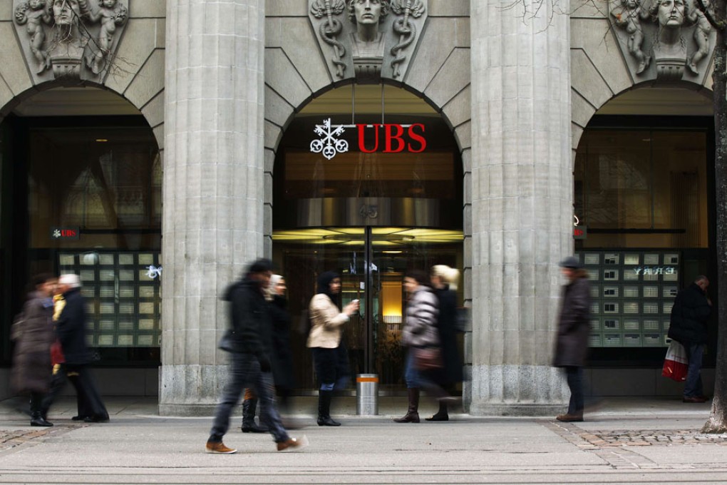 Third of Swiss banks seek US tax amnesty