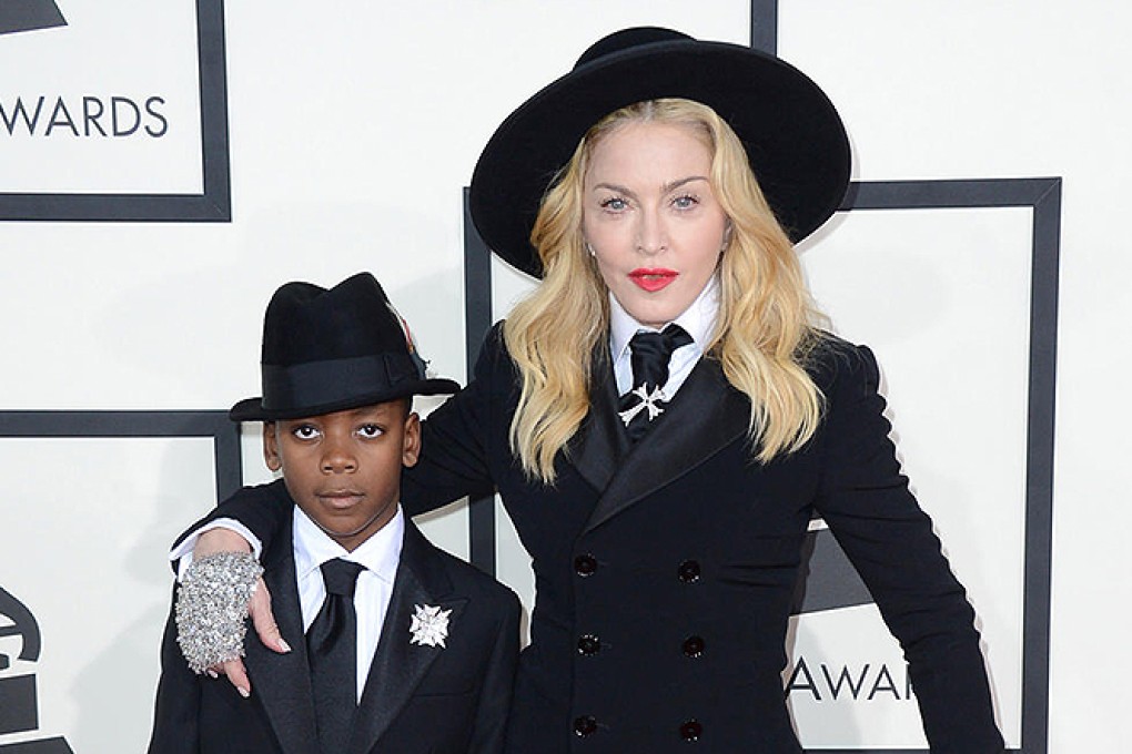 Well-suited Madonna and son David