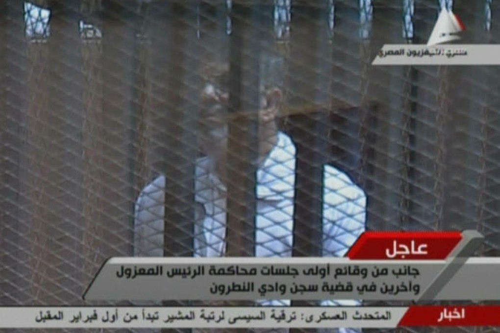 Mursi is being tried in Cairo along with 130 other inmates. Photo: AFP