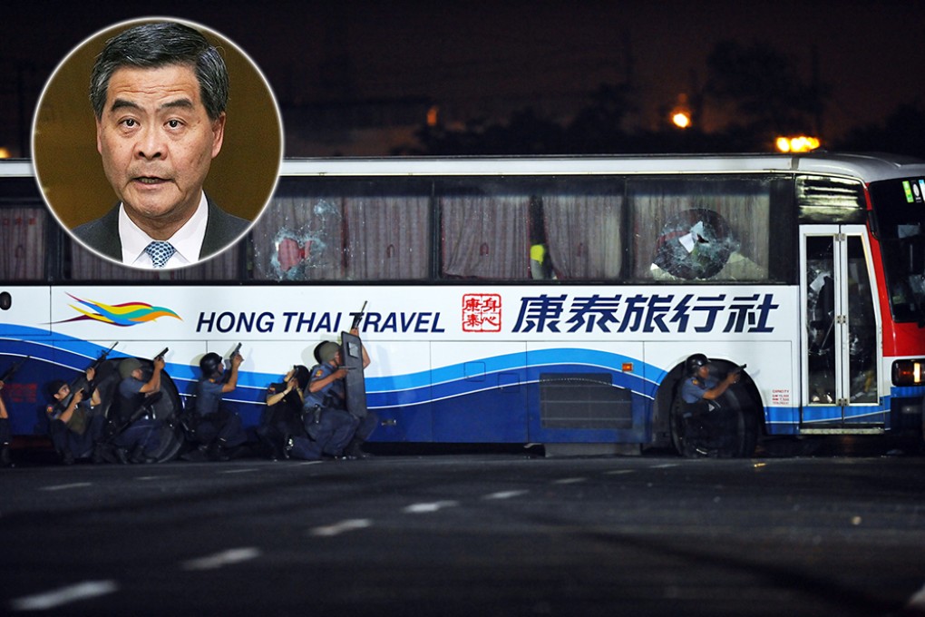 Chief Executive Leung Chun-ying (inset) announces the imposition of visa restrictions placed on diplomatic officials visiting Hong Kong from the Philippines. Photo: Dickson Lee