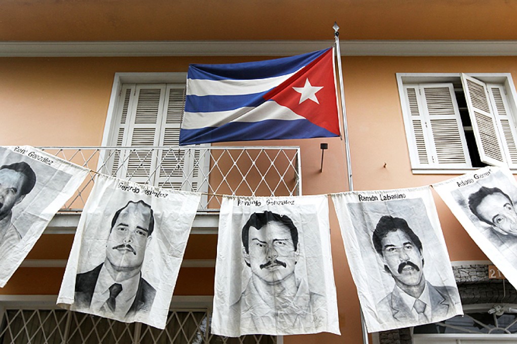 Posters with portraits of the so-called 'Cuban Five' jailed by the United States. Photo: AFP